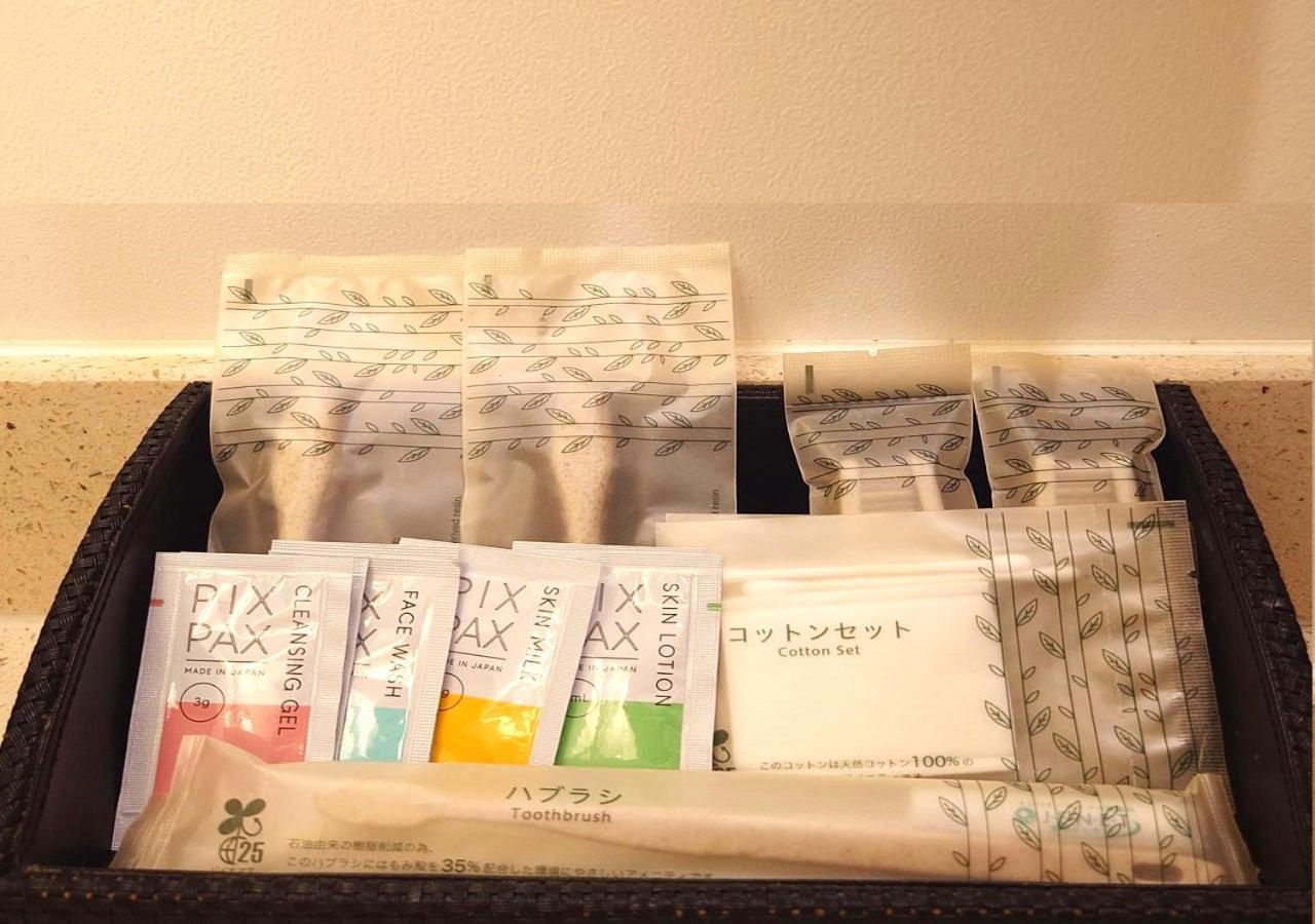 Hotel Monterey Okinawa Spa & Resort Онна Екстериор снимка A selection of toiletries in a hotel bathroom
