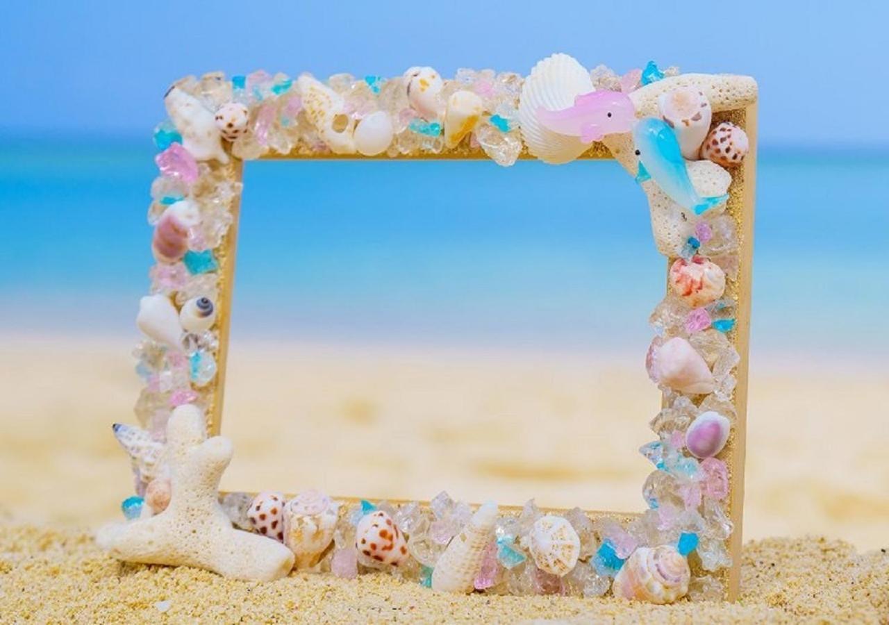 Hotel Monterey Okinawa Spa & Resort Онна Екстериор снимка A seashell frame